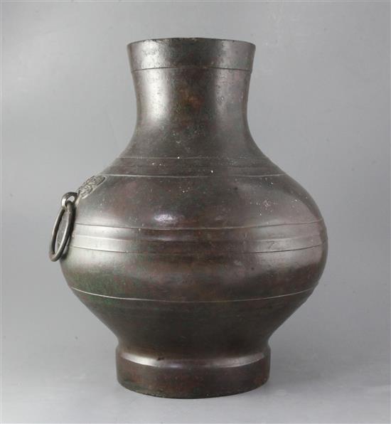 A Chinese bronze wine vessel, Hu, Han dynasty, height 43.5cm